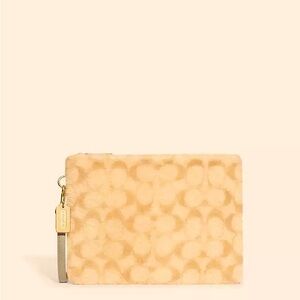 Coach®️ brand Pouch In Signature Shearling.